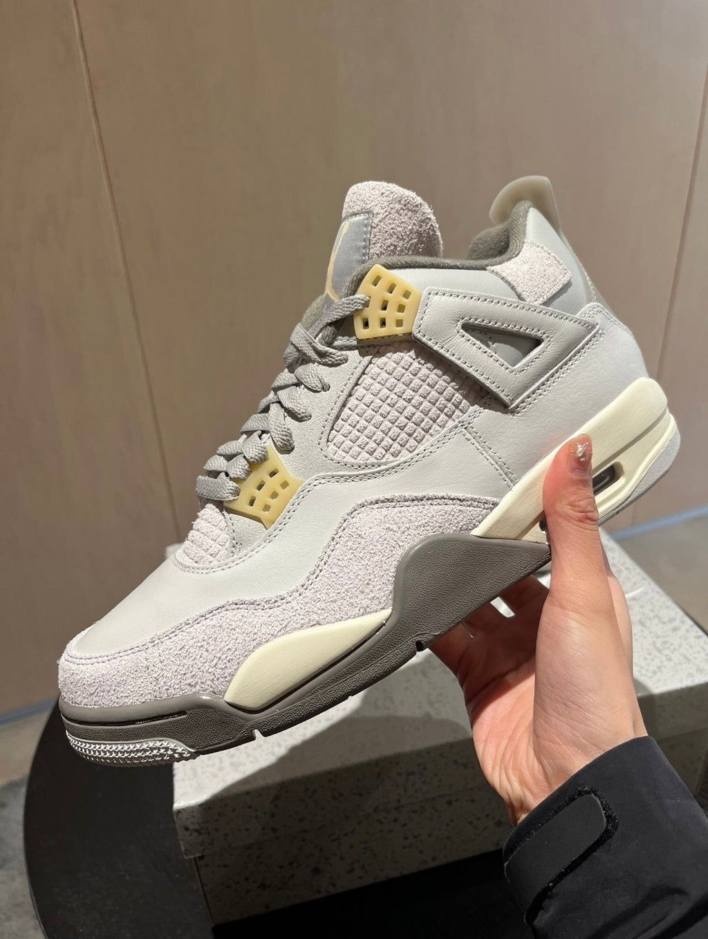 Air Jordan 4 SE Craft Sneakers in Grey DV3742-021 - product image from the listing.