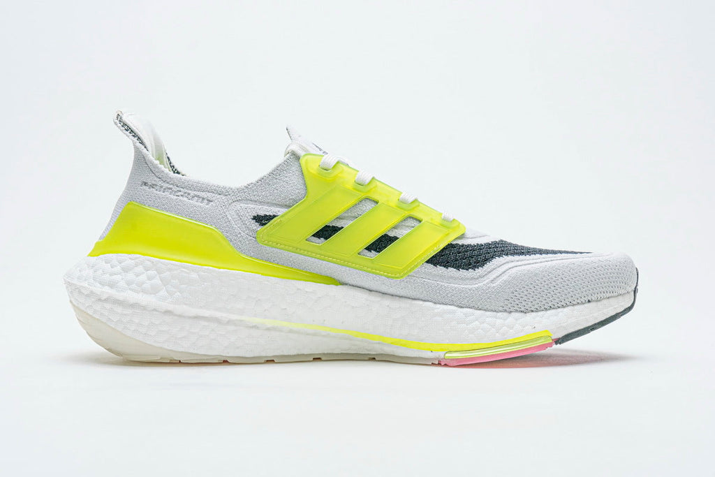 adidas UltraBoost 21 Running Shoes, in White and Volt FY1214 - product image from the listing.