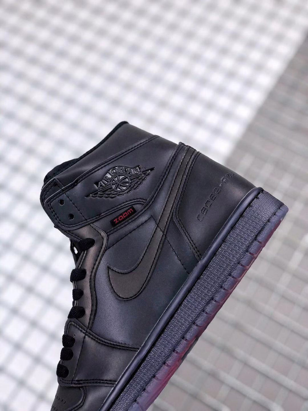 Air Jordan 1 High Zoom R2T Chameleon Sneakers in Black - product image from the listing.