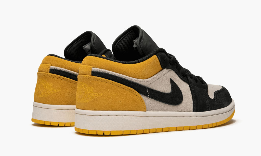 Air Jordan 1 Low in University Gold - product image from the listing.