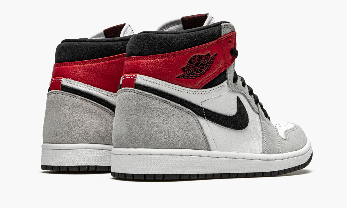Air Jordan 1 Retro High OG in Light Smoke Grey - product image from the listing.