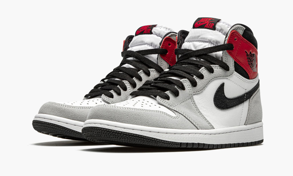 Air Jordan 1 Retro High OG in Light Smoke Grey - product image from the listing.