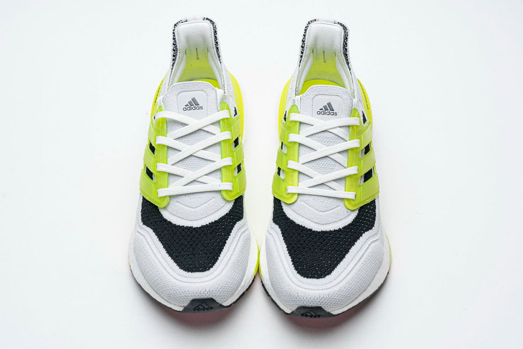 adidas UltraBoost 21 Running Shoes, in White and Volt FY1214 - product image from the listing.