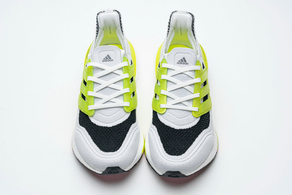 adidas UltraBoost 21 Running Shoes, in White and Volt FY1214 - product image from the listing.