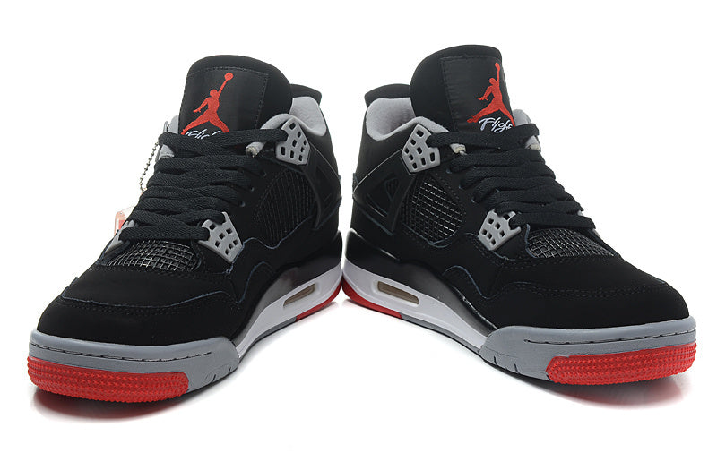Jordan 4 Retro Basketball Shoes in Black/Red - product image from the listing.
