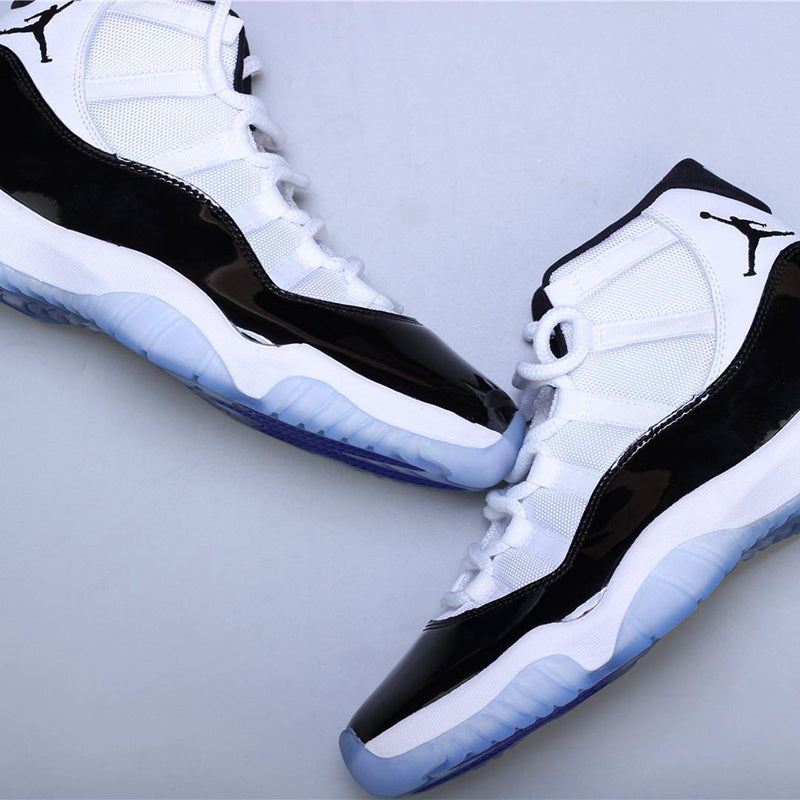 Air Jordan 11 Concord Black White Sneakers - product image from the listing.