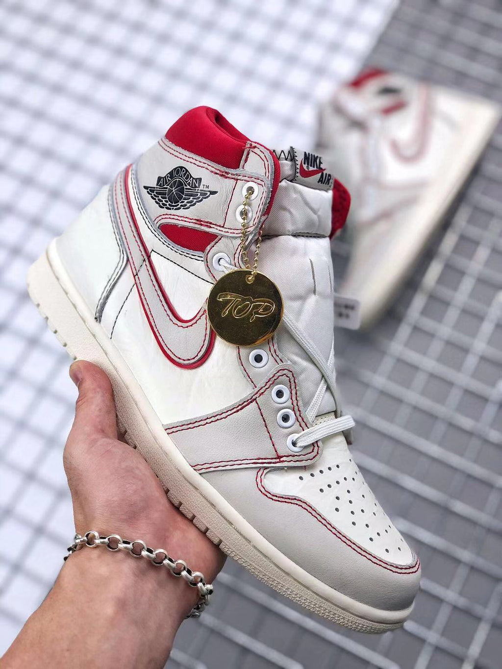Air Jordan 1 Retro High OG Sneakers in White and Red - product image from the listing.