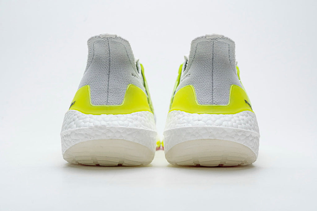 adidas UltraBoost 21 Running Shoes, in White and Volt FY1214 - product image from the listing.