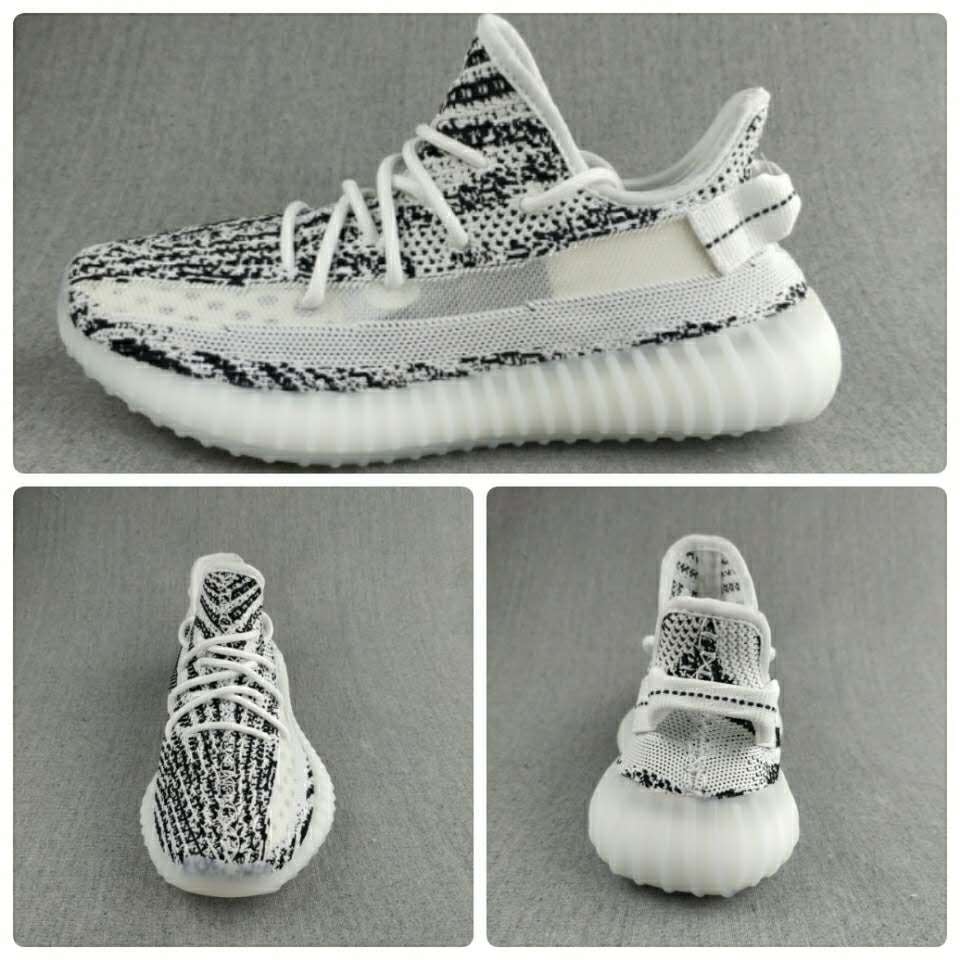 Black and White Yeezy 350 V2 Knit Sneakers - product image from the listing.