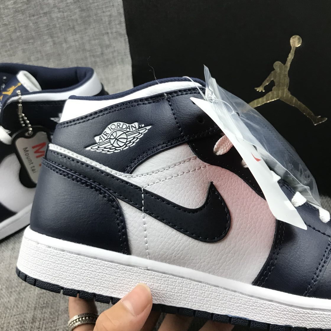 What The Obsidian Sneakers - Jordan 1 Mid 554724-174 - product image from the listing.