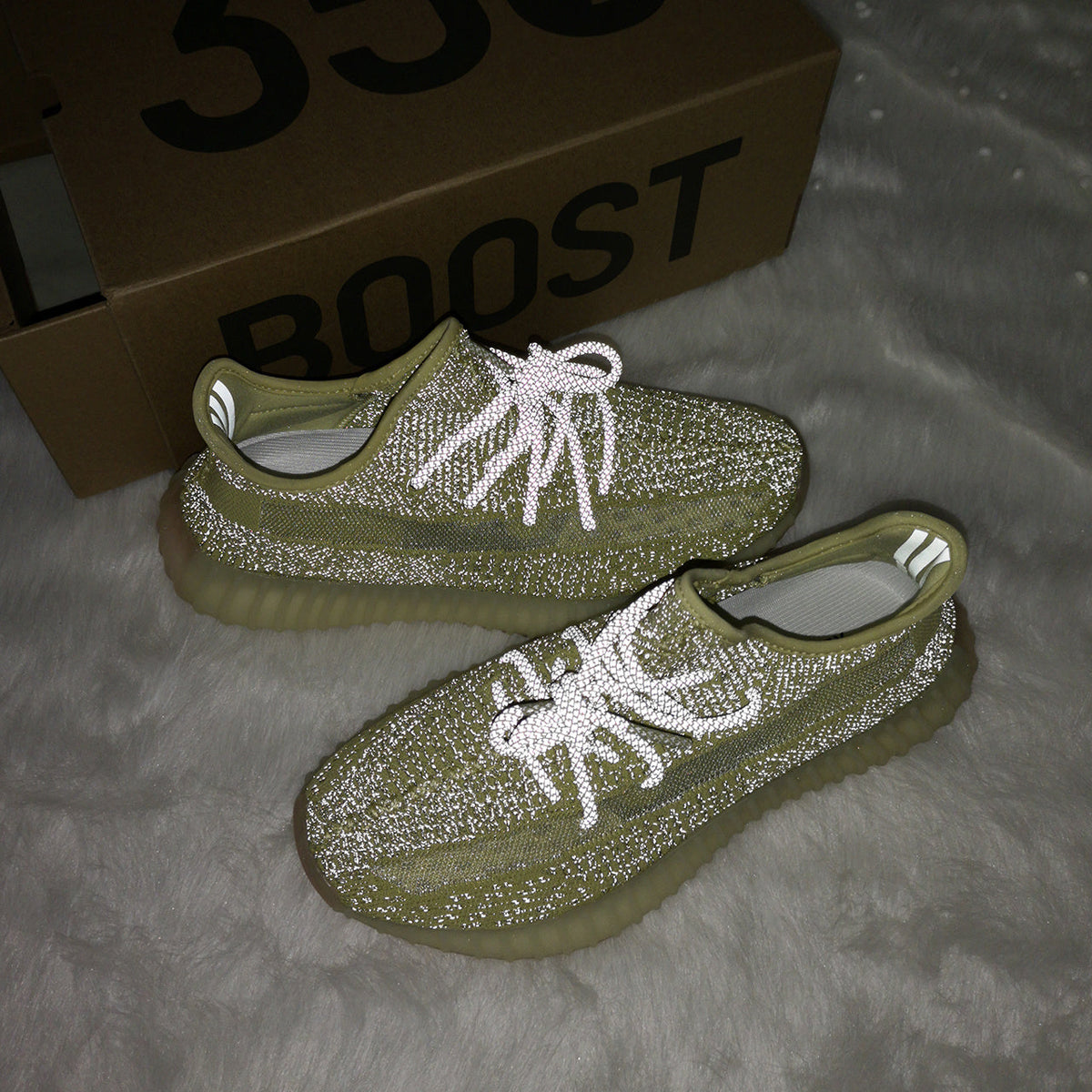 Pale Yellow adidas Yeezy Boost 350 V2 Sneakers - product image from the listing.