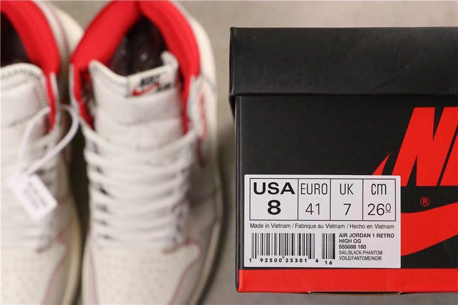 Air Jordan 1 Retro High OG Sneakers in White and Red - product image from the listing.