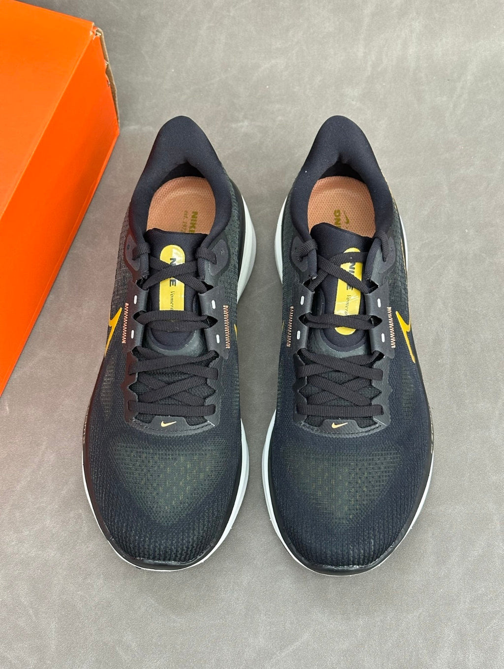 Nike Air Zoom Vomero 17 Running Shoes in Black Gold FB1309-006 - product image from the listing.