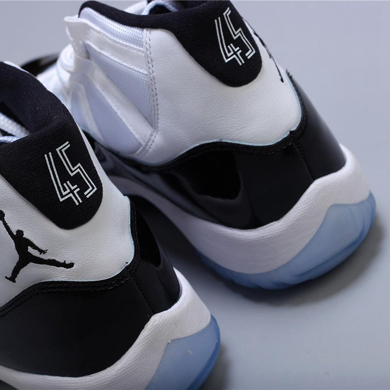 Air Jordan 11 Concord Black White Sneakers - product image from the listing.