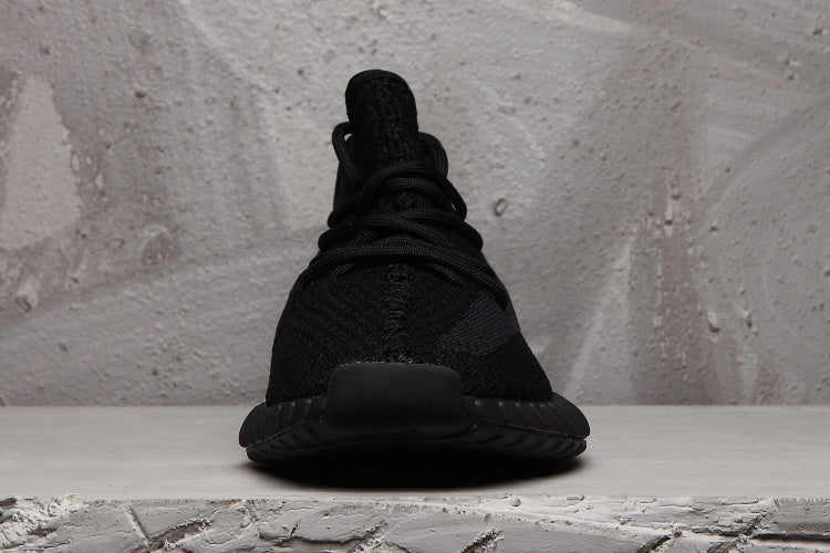 Yeezy Boost 350 V2 Sneakers in Black Knit - product image from the listing.