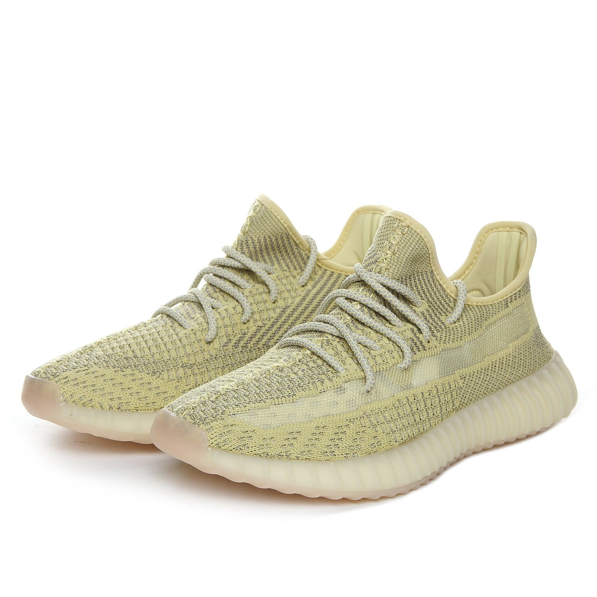 Pale Yellow adidas Yeezy Boost 350 V2 Sneakers - product image from the listing.