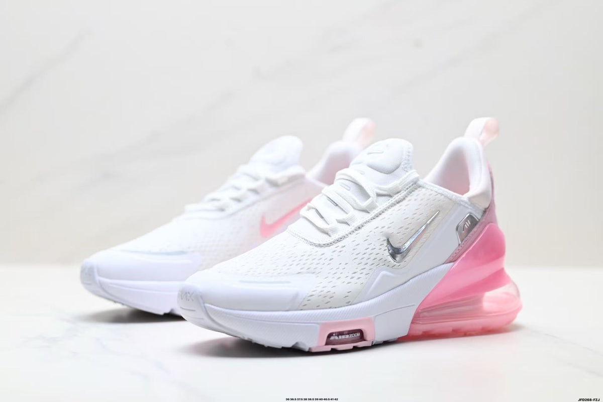 Nike Air Zoom Sneakers in White and Pink - product image from the listing.