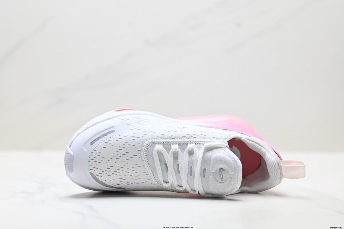 Nike Air Zoom Sneakers in White and Pink - product image from the listing.