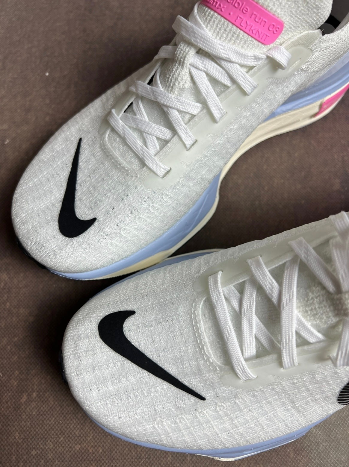 Nike ZoomX Invincible Run 3 Running Shoes in White Blue DR2615-100 - product image from the listing.