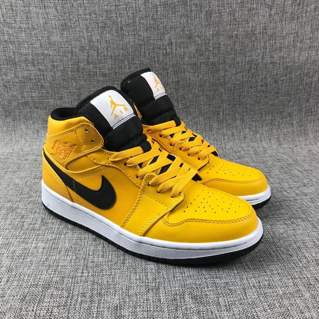 Air Jordan 1 Mid Sneakers in University Gold Black White - product image from the listing.