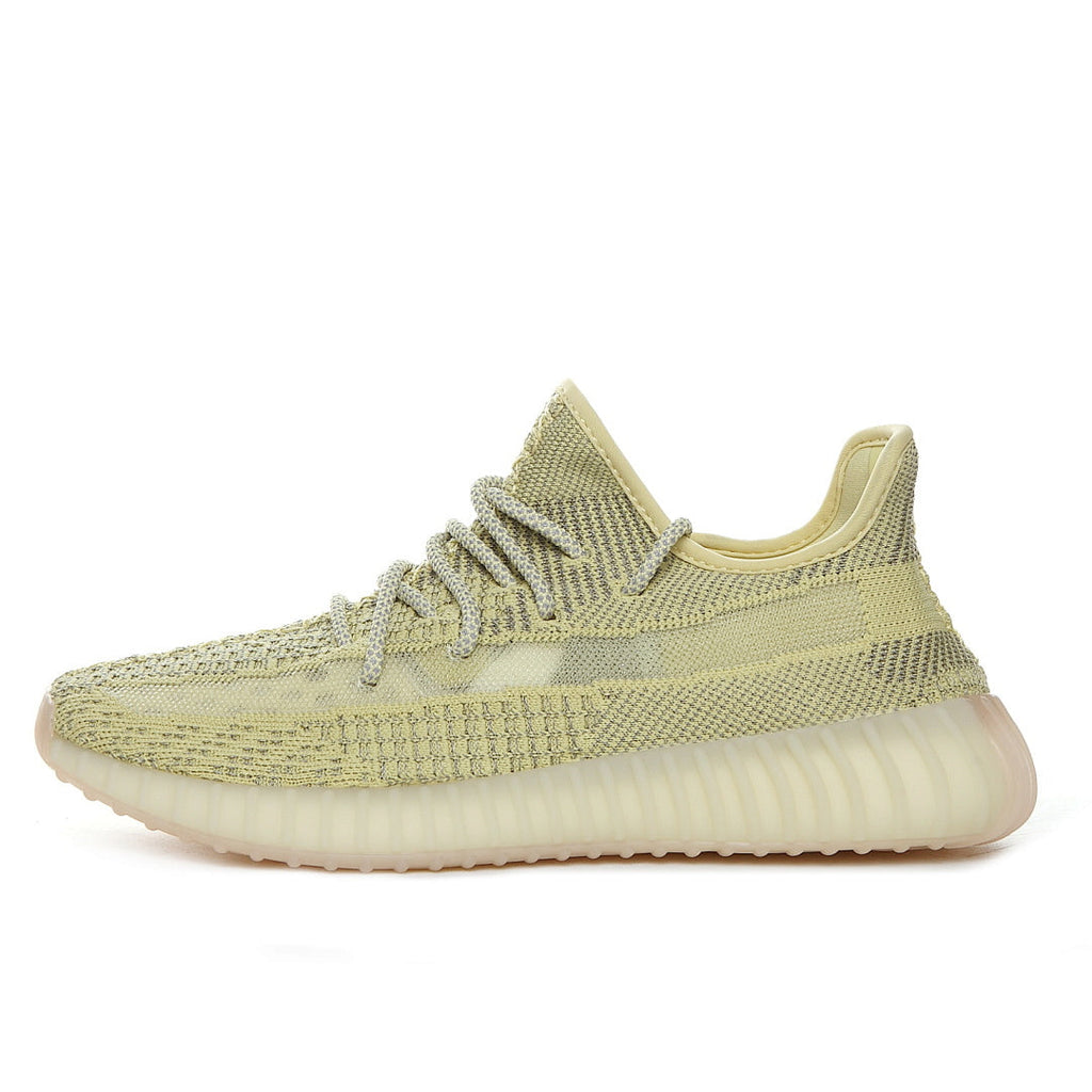 Pale Yellow adidas Yeezy Boost 350 V2 Sneakers - product image from the listing.
