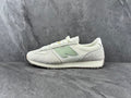 New Balance Retro Sneakers for Running in Cream and Sage - product image from the listing.
