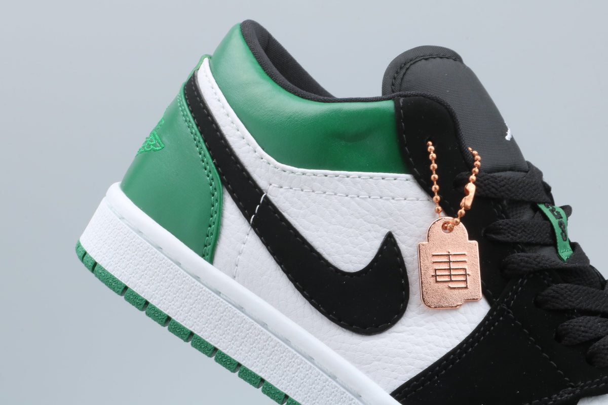 Jordan 1 Low Green Toe Sneakers in Black White Green - product image from the listing.