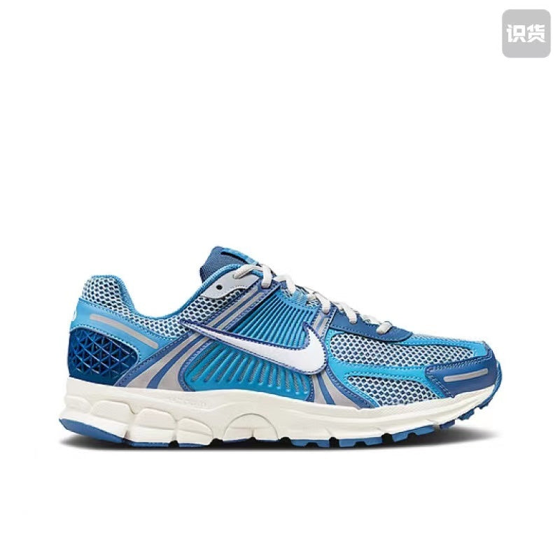 Nike Zoom Vomero 5 Sneakers in White Blue Silver - product image from the listing.