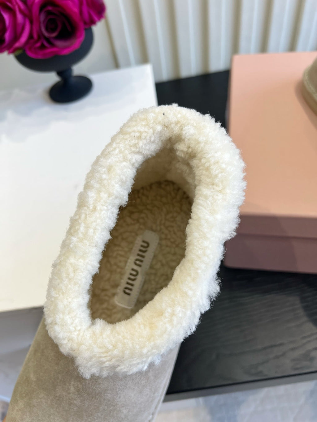 2026 Snow Ankle Boots Suede 977010 by Miu Miu - product image from the listing.