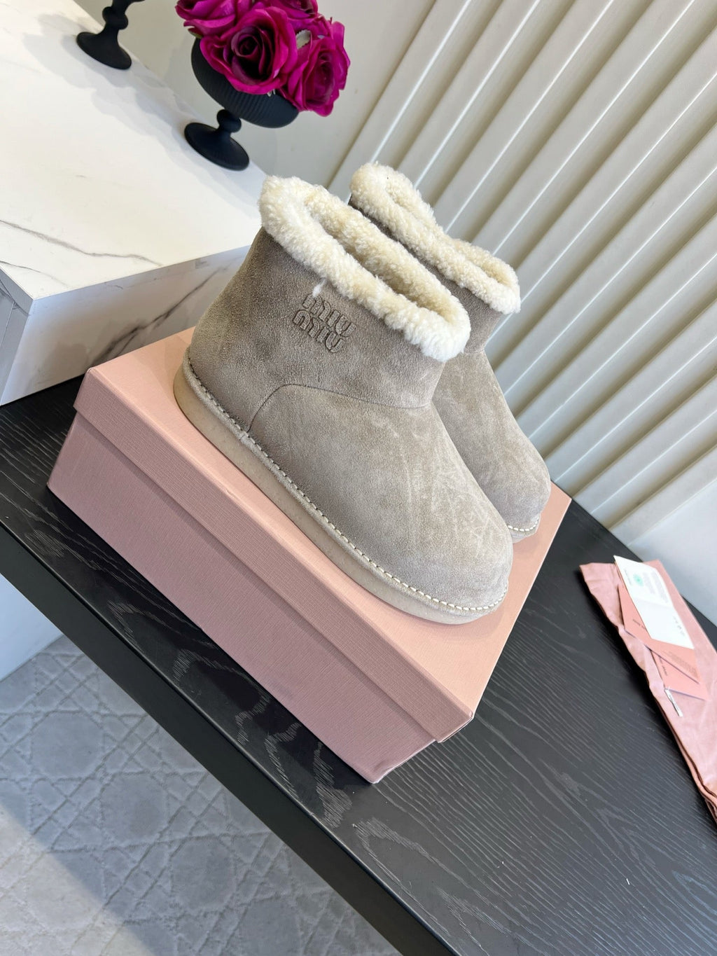 2026 Snow Ankle Boots Suede 977010 by Miu Miu - product image from the listing.