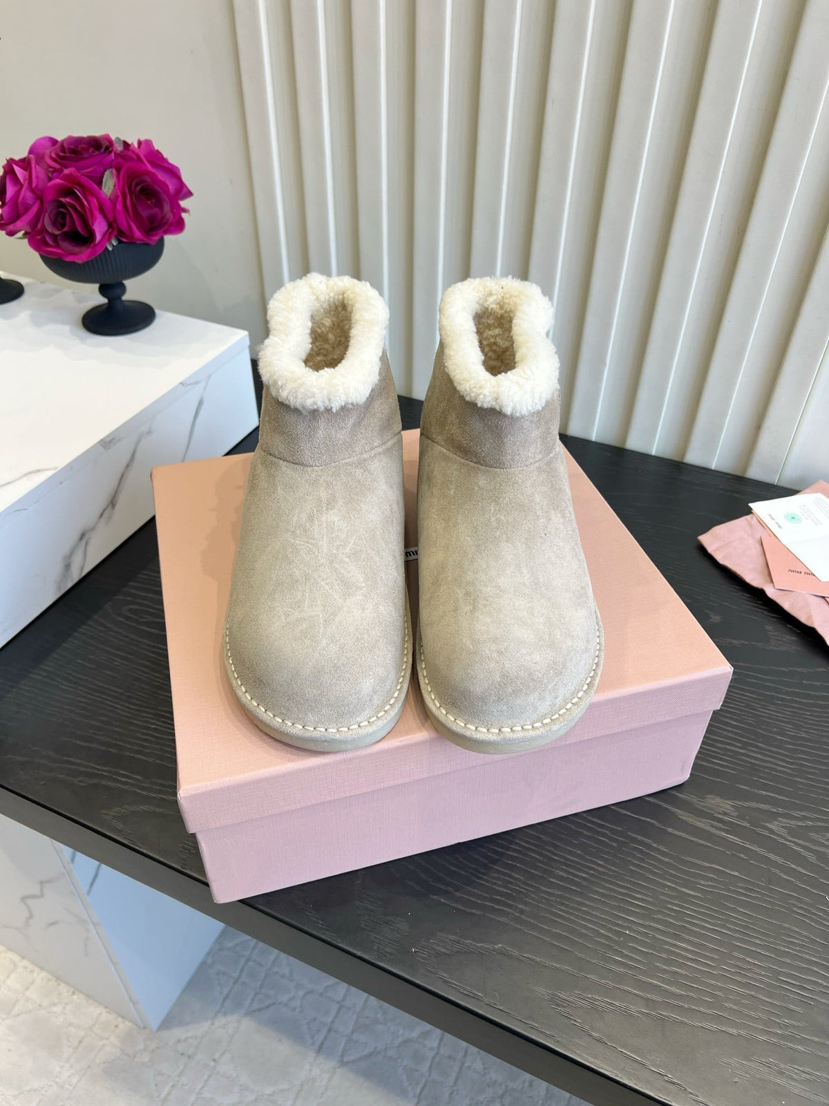 2026 Snow Ankle Boots Suede 977010 by Miu Miu - product image from the listing.