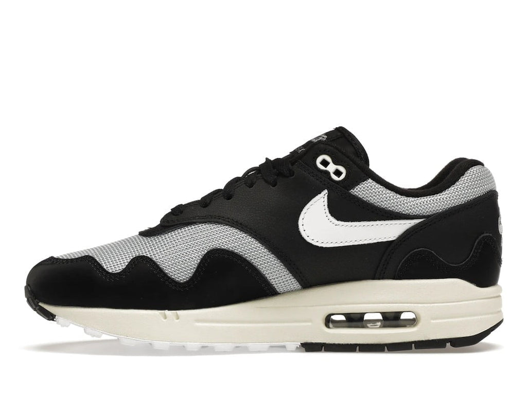 with Bracelet - Nike Air Max 1 Patta Waves Black - product image from the listing.