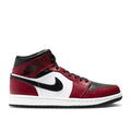 Air Jordan 1 Mid 'Chicago Black Toe' Footwear - product image from the listing.